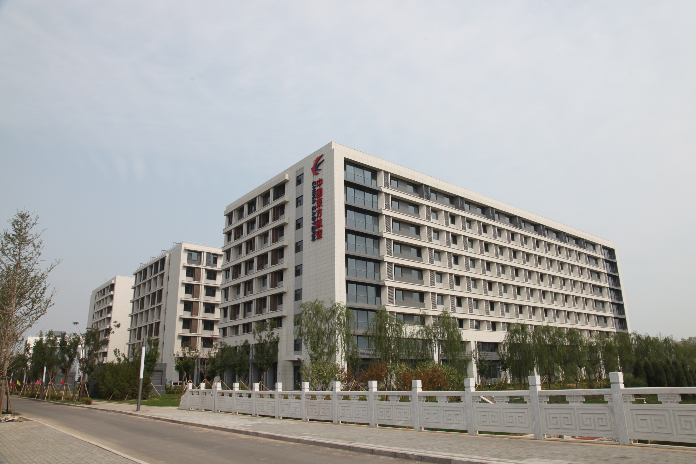 北京 大兴国际机场 保温装饰一体板 浅米�?真石�?岩棉 2019 公共建筑1.JPG
